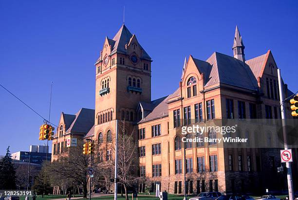 wayne state university, old main building with historic landmark architecture, detroit, michigan - detroit michigan stock pictures, royalty-free photos & images