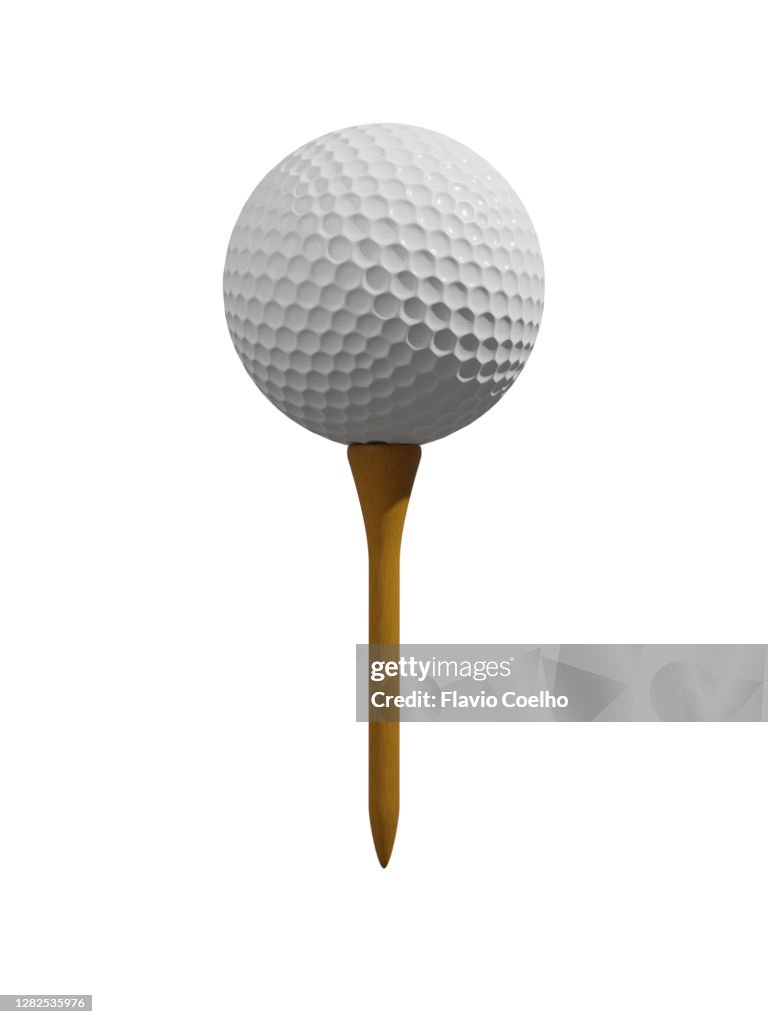 Golf ball on tee isolated on white background