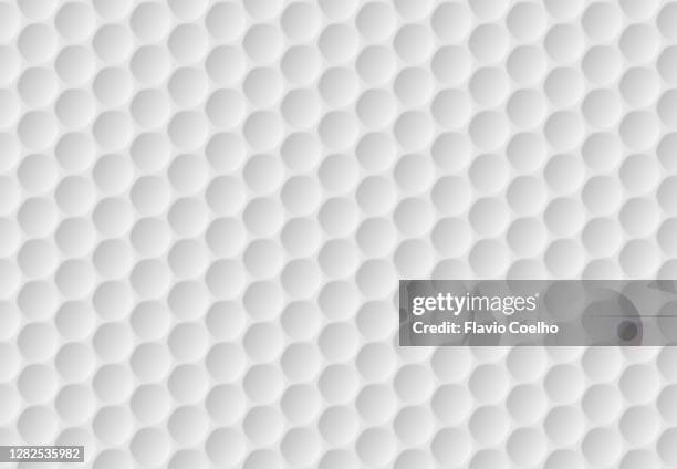 golf ball texture surface background - golfball stock-fotos und bilder