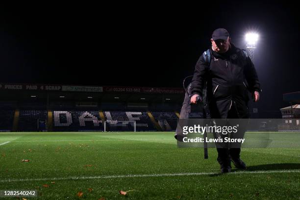 Groundsman is seen blowing leaves off the pitch prior to the Sky Bet League One match between Rochdale and Sunderland at Crown Oil Arena on October...
