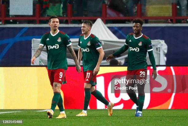 Anton Miranchuk of Lokomotiv Moscow celebrates after he scores his team's first goal during the UEFA Champions League Group A stage match between...