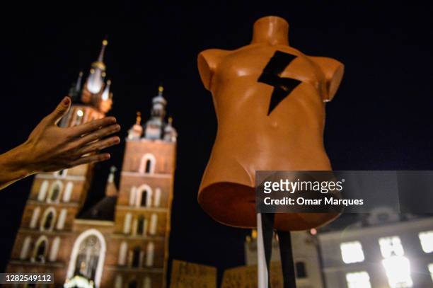 Mannequin with the Women's strike symbol is pictured during a protest for the sixth day against the Constitutional Court ruling on tightening the...