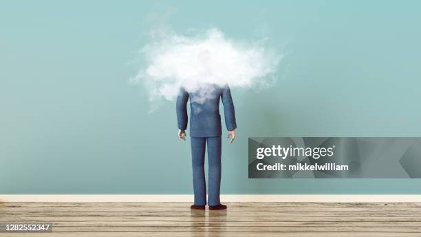 concept of holding your head in the clouds - schizophrenia stock pictures, royalty-free photos & images