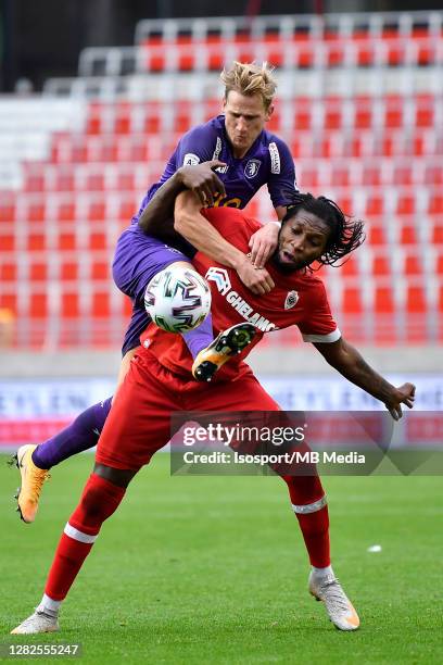 Joren Dom of Beerschot battles for the ball with Dieumerci Mbokani of Antwerp during the Jupiler Pro League match between Royal Antwerp FC and K....