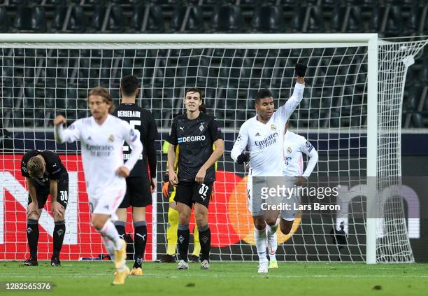 Casemiro of Real Madrid celebrates after he scores his team's second goal during the UEFA Champions League Group B stage match between Borussia...