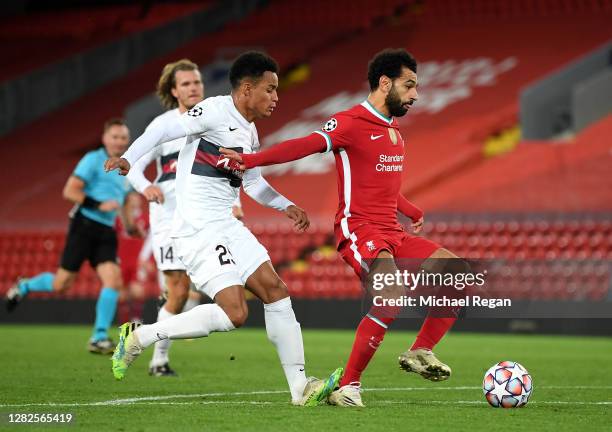 Mohamed Salah of Liverpool is fouled by Paulinho of FC Midtjylland which leads to a penalty being awarded during the UEFA Champions League Group D...