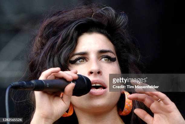 Amy Winehouse performs during day one of the Virgin Music Festival at Pimlico Racetrack on August 4, 2007 in Baltimore, Maryland.