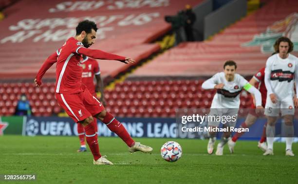 Mohamed Salah of Liverpool scores his team's second goal from the penalty spot during the UEFA Champions League Group D stage match between Liverpool...