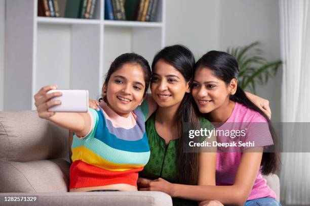 group of friends at home stock photo - selfie girl stock pictures, royalty-free photos & images