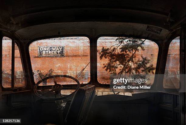 automobile interior and brick wall - car crash wall stock pictures, royalty-free photos & images