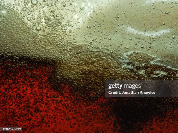 close up bubbles in liquid - beer close up stock pictures, royalty-free photos & images