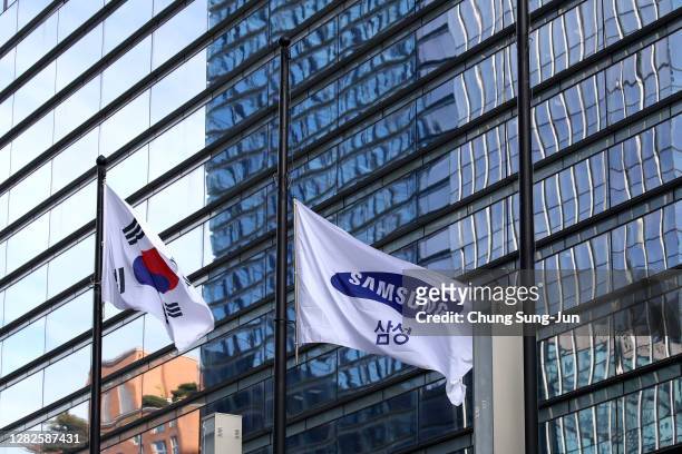 Samsung flag is flown at half-staff outside the Samsung office on October 28, 2020 in Seoul, South Korea. Samsung Electronics chairman Lee Kun-hee,...