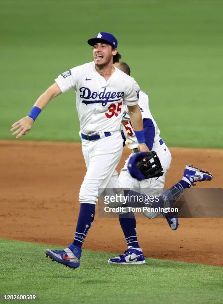 Cody Bellinger of the Los Angeles Dodgers celebrates defeating the Tampa Bay Rays 3-1 in Game Six to win the 2020 MLB World Series at Globe Life...