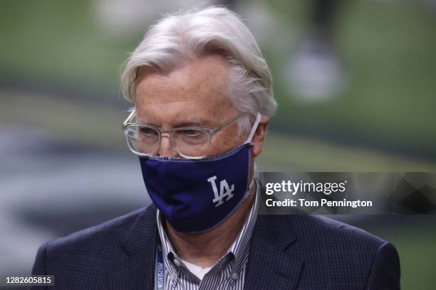 Owner Mark Walter of the Los Angeles Dodgers celebrates with the team after defeating the Tampa Bay Rays 3-1 in Game Six to win the 2020 MLB World...