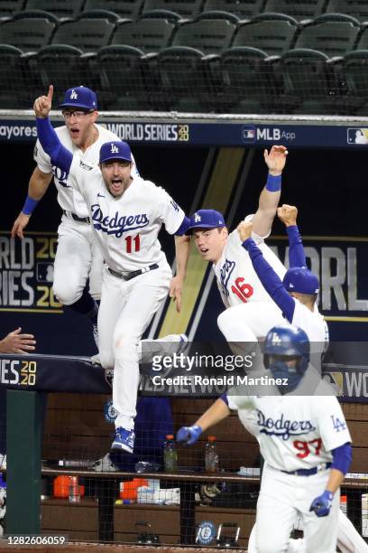 Pollock and Will Smith of the Los Angeles Dodgers celebrate after defeating the Tampa Bay Rays 3-1 in Game Six to win the 2020 MLB World Series at...