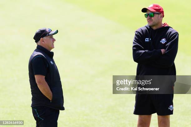 New Zealand Black Caps Head Coach Gary Stead and Head Coach Peter Fulton of Canterbury look on during day one of the Plunket Shield match between...