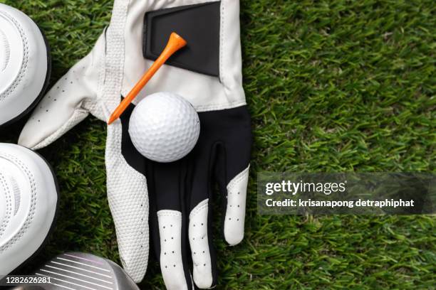 golf ,golf ball - golfhandschuh stock-fotos und bilder