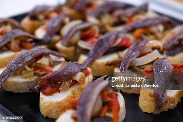 anchovy 'pinchos' - anchova imagens e fotografias de stock