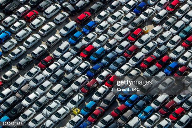 aerial view of parked cars - car parked stock pictures, royalty-free photos & images