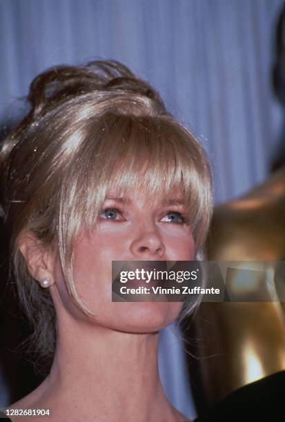 American actress Kim Basinger attends the 63rd Annual Academy Awards, held at Shrine Auditorium in Los Angeles, California, 25th March 1991.