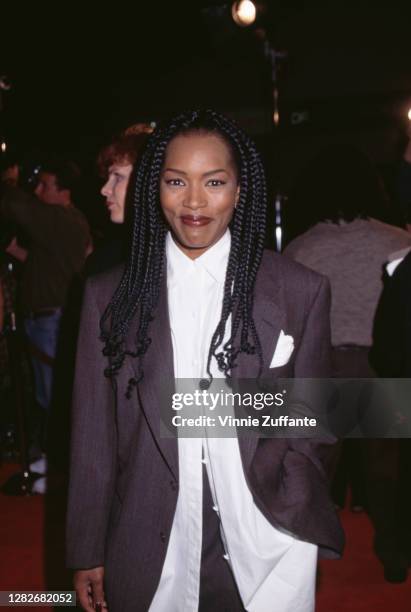 American actress Angela Bassett attends the premiere of 'Strange Days', held at the Mann Village Theatre in Los Angeles, California, 10th October...