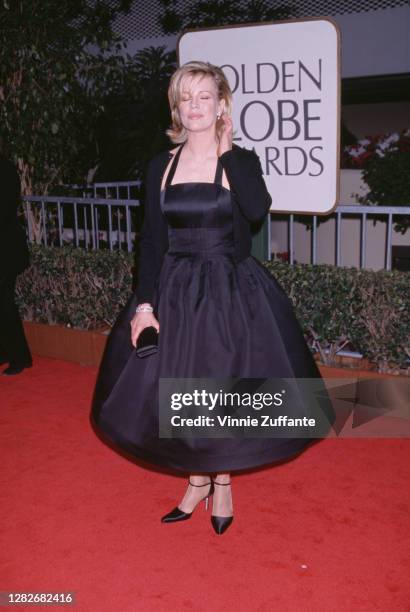 American actress Kim Basinger attends the 55th Annual Golden Globe Awards, held at the Beverly Hilton Hotel in Beverly Hills, California, 18th...