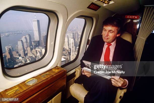 Donald Trump in 1987, flying aboard his Puma helicopter from NYC to Atlantic City.