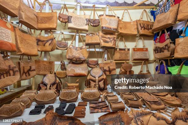 leather handcrafted cuban souvenirs for sale, holguin, cuba - holguin stock-fotos und bilder