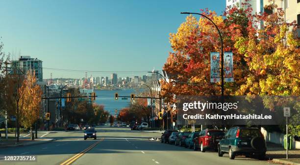 lonsdale avenue at 4th street, north vancouver, canada, in autumn - north vancouver stock pictures, royalty-free photos & images