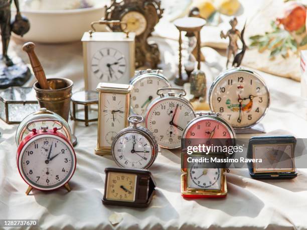 alarm clocks at the flea market - flea market stock pictures, royalty-free photos & images