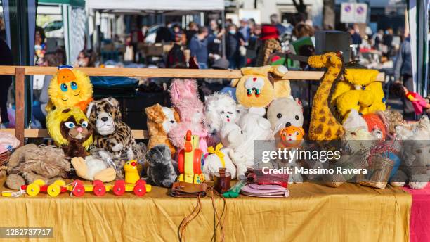 vintage toys at the flea market - toys collection stock pictures, royalty-free photos & images