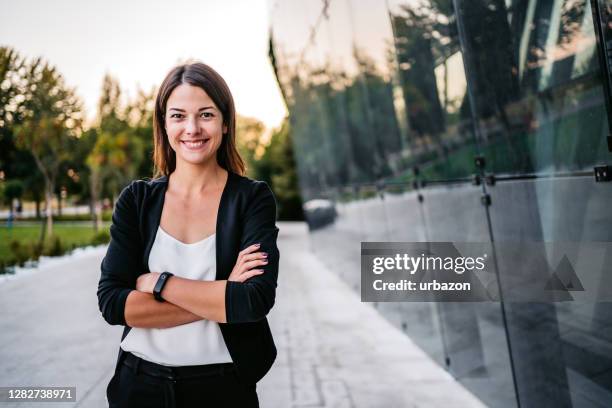 smiling young businesswoman - legal expertise stock pictures, royalty-free photos & images