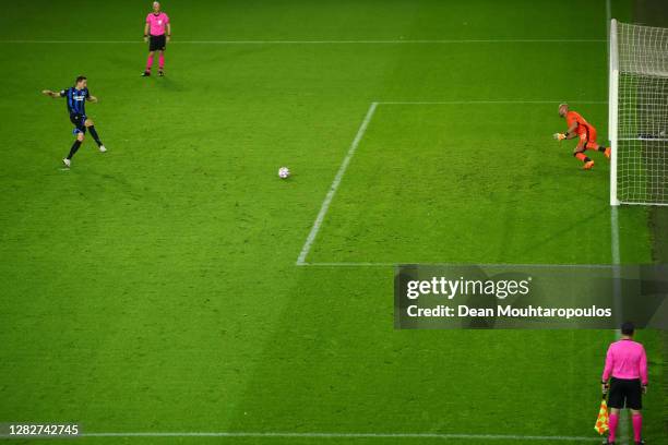 Hans Vanaken of Club Brugge KV scores his sides first goal from the penalty spot past Pepe Reina of SS Lazio during the UEFA Champions League Group F...