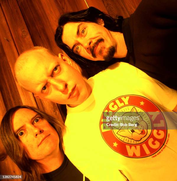 Guitarist Paul Leary, drummer King Coffey and lead vocalist/keyboards Gibby Haynes of the American rock band the Butthole Surfers pose for a group...