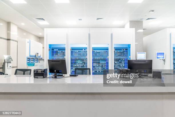 Computer System In Pharmacy Counter 96 Pharmacy Robotics Stock Photos, High-Res Pictures, and Images ...
