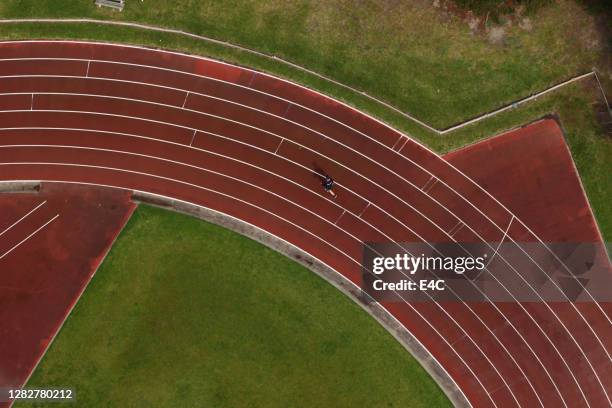 aerial view of athletic track - race track stock pictures, royalty-free photos & images