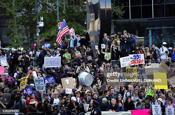 Union members and Occupy Wall Street protesters stage a protest near Wall Street in New York, October 5, 2011. The demonstrators are protesting bank...