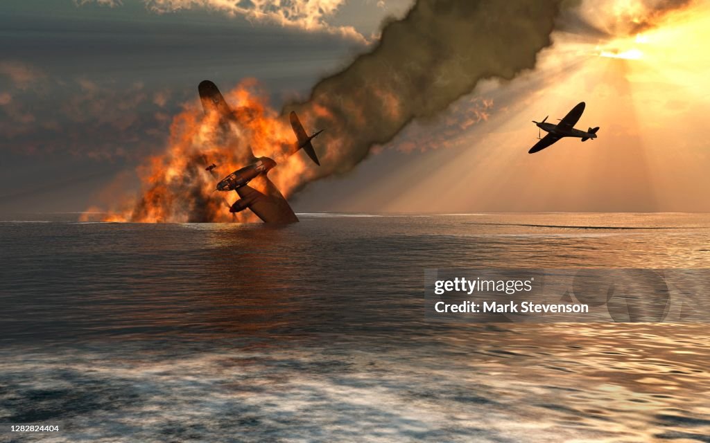 An RAF Spitfire Shooting Down A German Henkel Bomber
