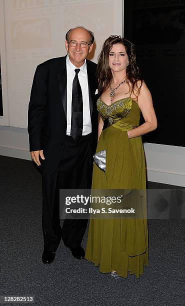 Executive Editor, National Enquirer Barry Levine, and Maria Elena Tierno attend the "Warhol: Headlines" exhibition opening in the East Building at...