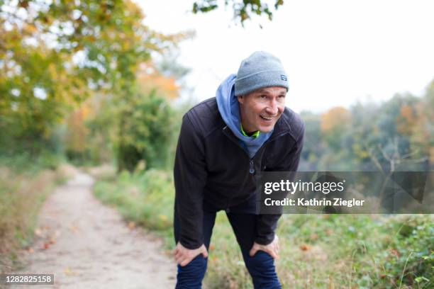 man out of breath after running - ingolstadt training session stock pictures, royalty-free photos & images