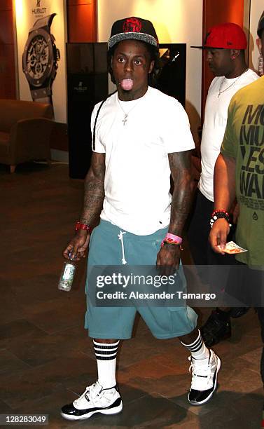 Lil Wayne makes an appearance at the Chris Brown concert at American Airlines Arena on October 5, 2011 in Miami, Florida.