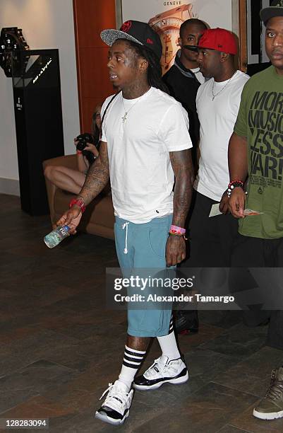 Lil Wayne makes an appearance at the Chris Brown concert at American Airlines Arena on October 5, 2011 in Miami, Florida.