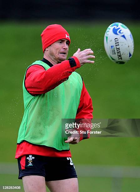 Wing Shane Williams passes the ball during a Wales IRB Rugby World Cup 2011 training session at Newtown Park on October 6, 2011 in Wellington, New...