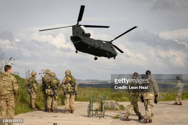 Helicopter carries senior military personnel around the active area during the Mission Rehearsal Exercise ahead of the UK Task Group deployment to...