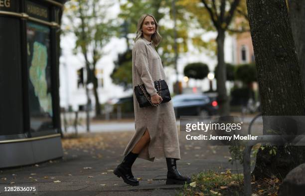 Louisa Theresa Grass wearing Mango knit dress, Nakd boots and Chanel bag on October 22, 2020 in Hamburg, Germany.