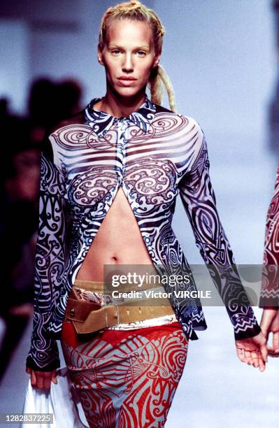 Emma Sjoberg walks the runway during the Jean Paul Gaultier Ready to Wear fashion show as part of Paris Fashion Week Spring/Summer 1996 on October...