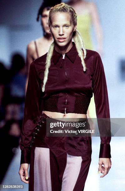 Emma Sjoberg walks the runway during the Jean Paul Gaultier Ready to Wear fashion show as part of Paris Fashion Week Spring/Summer 1996 on October...