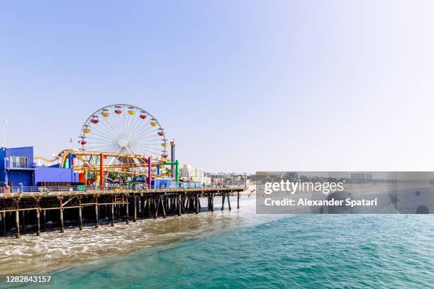 santa monica beach and pier on a sunny day, los angeles, usa - santa monica beach pier fotografías e imágenes de stock