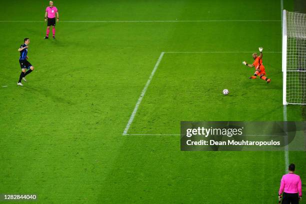 Hans Vanaken of Club Brugge KV shoots and scores his teams first goal of the game from the penalty spot past Goalkeeper, Pepe Reina of SS Lazio...