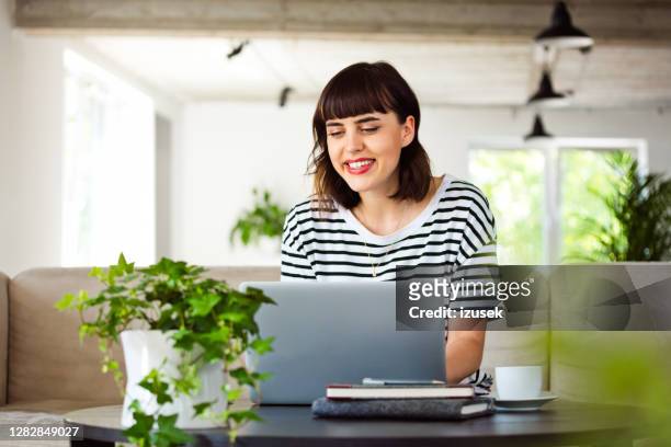 young woman having video call - copy writing stock pictures, royalty-free photos & images